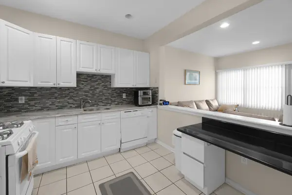 Kitchen with breakfast-bar peninsula