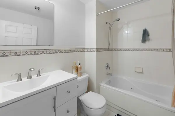 Full bathroom with tub and shower