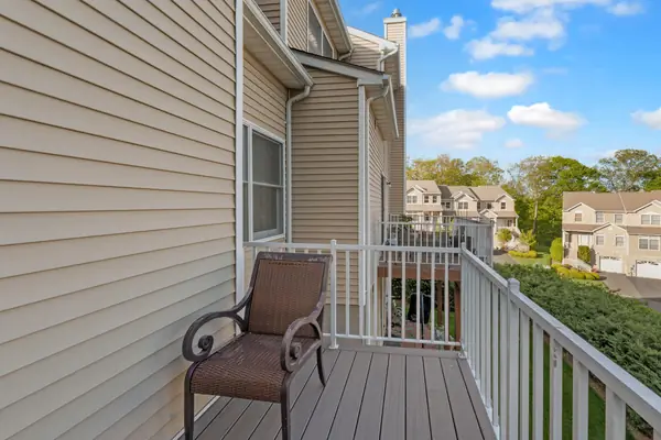 Deck and balcony view of the neighborhood